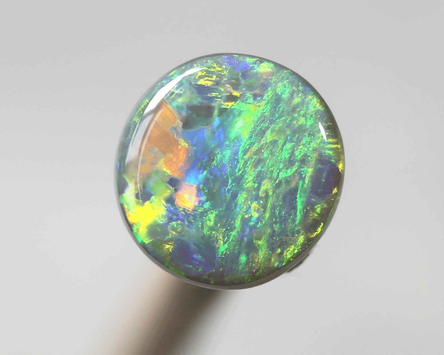 1.1 ct dark opal set in a silver ring