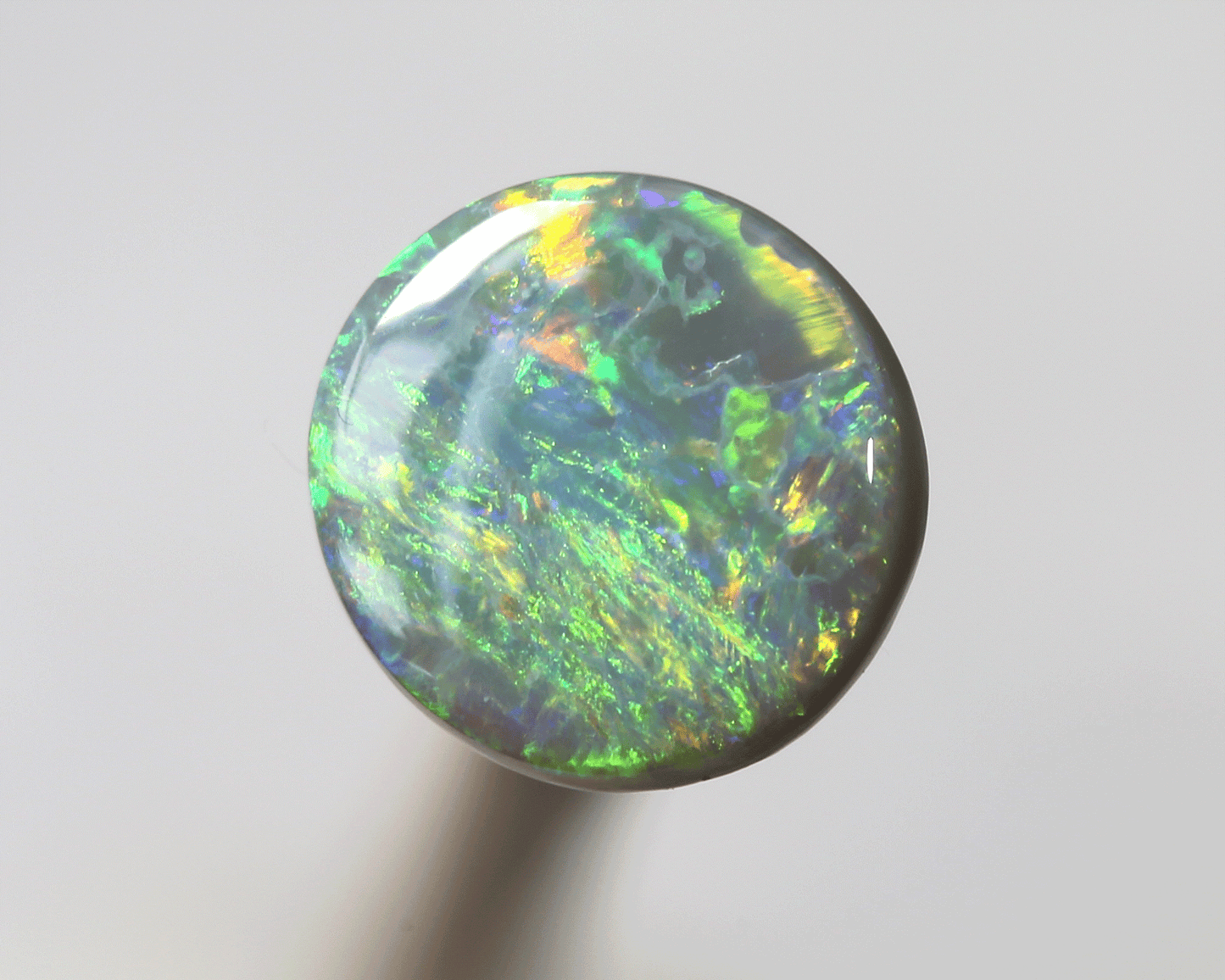 1.1 ct dark opal set in a silver ring