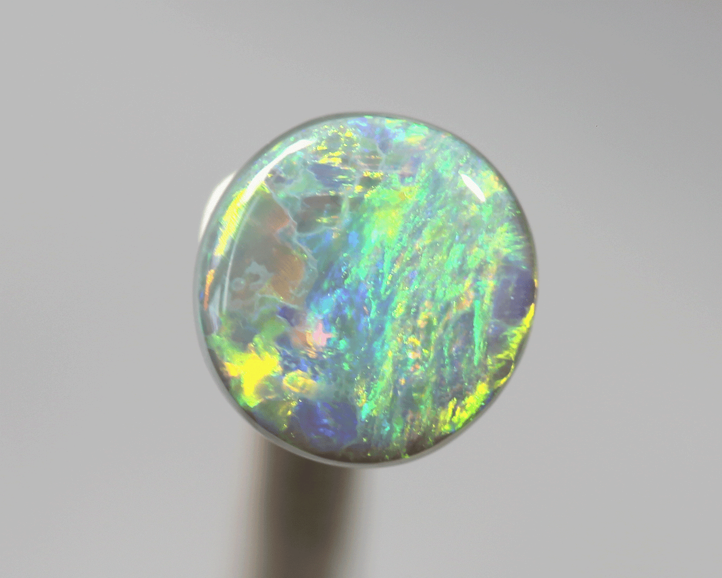 1.1 ct dark opal set in a silver ring