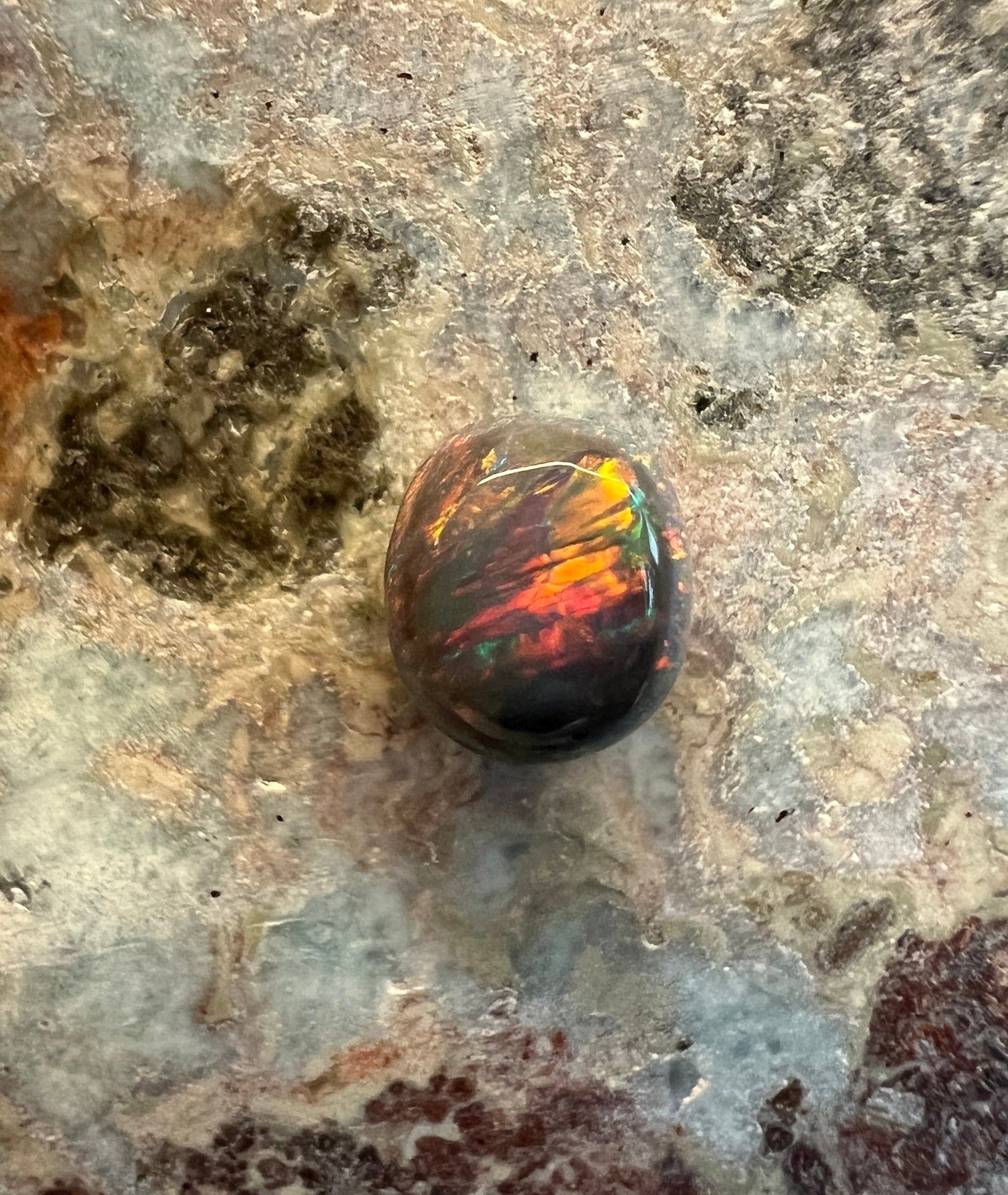 0.6 ct Black Opal
